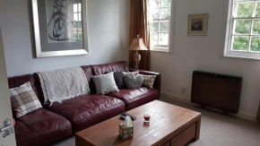 Listed lodge building overlooking Himley Park
